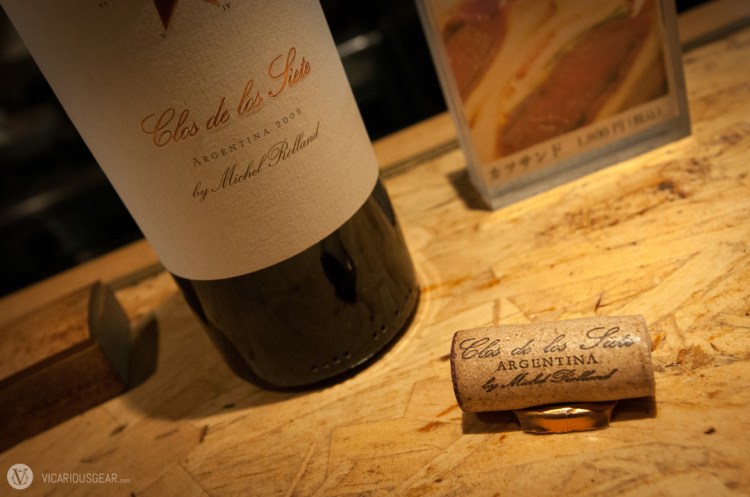 Using the dimpled tip of the capsule as a stable presentation base for the cork was a nice touch.