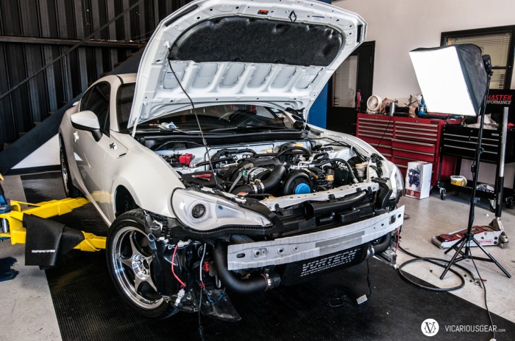 1st car under the knife was Chris' white FR-S. Love how the shop uses soft boxes for movable lighting.
