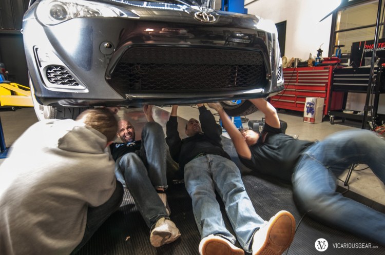 Freshly refueled, the local FR-S/BRZ gang got to work on Victor's car. Things sure do go fast when you have a team of 5-6 people working on an install. I can't believe how many clips are used to hold that bumper.