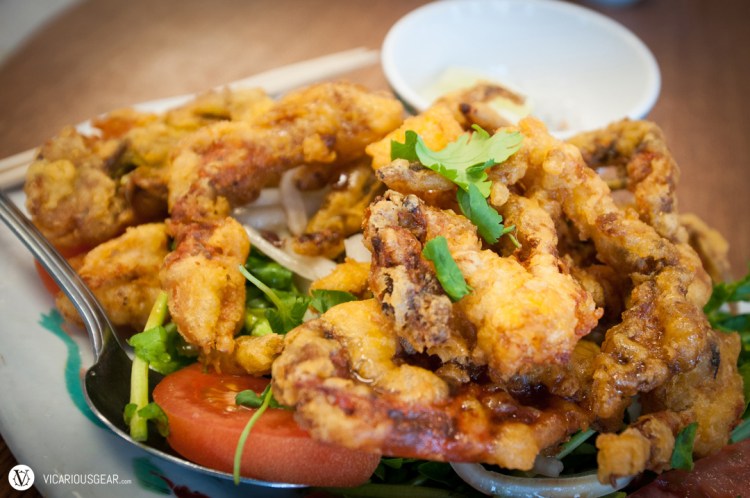 Butter fried soft-shell crab over a bed of lightly pickled watercress and tomato. Dip it in the muối tiêu chanh for a taste of crispy perfection.