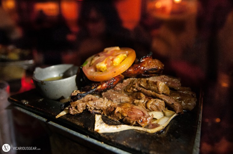 El Tiempo beef filet and quail for their awesome fajitas. It was crazy dark in there. Lit by my friend Kaider's iPhone. lol