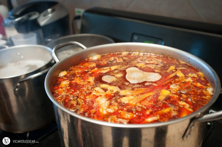 A huge boiling pot of home-made Bún bò! 
