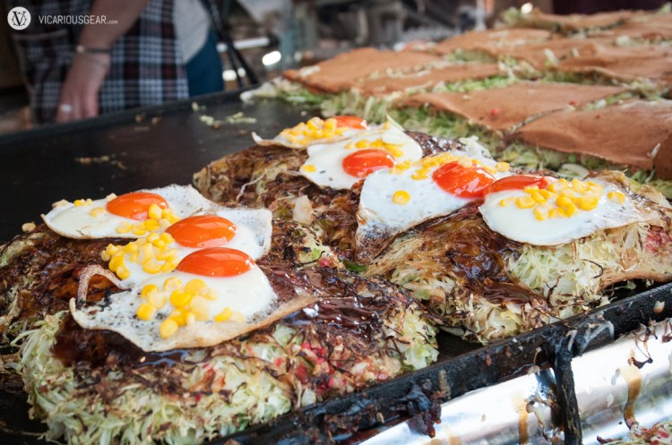 Okonomiyaki stand. The red yolks caught my eye then I couldn't resist buying from the sweet old lady making them.