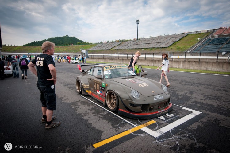 Nakai asked a couple who was visiting from France to steer the car into position as we pushed.