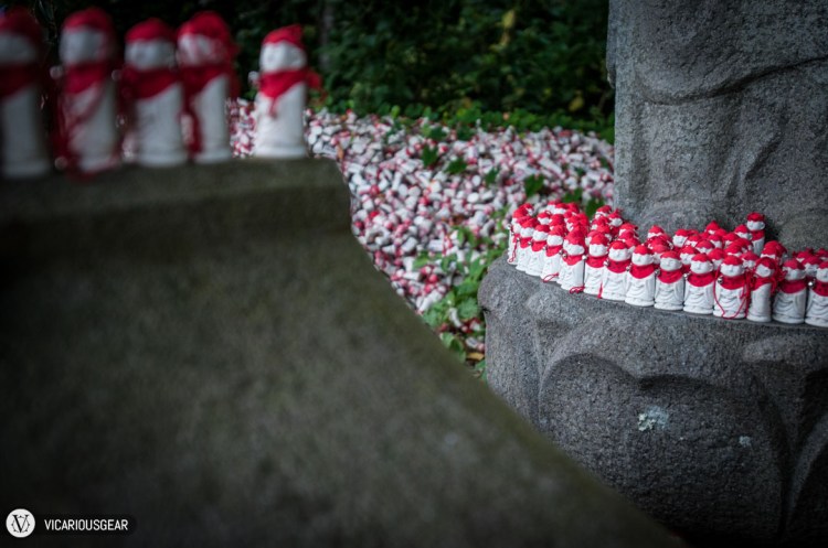 We were so taken in by the sight of the Daibutsu that we didn't even notice the mounds of little Jizō (お地蔵様) charms off to the left under a tree until we turned back to leave.