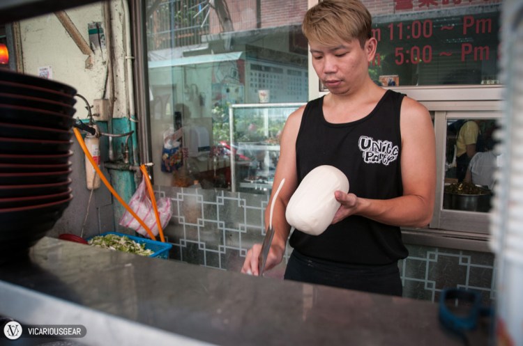 A younger chef making noodles fly after we finished our meal.