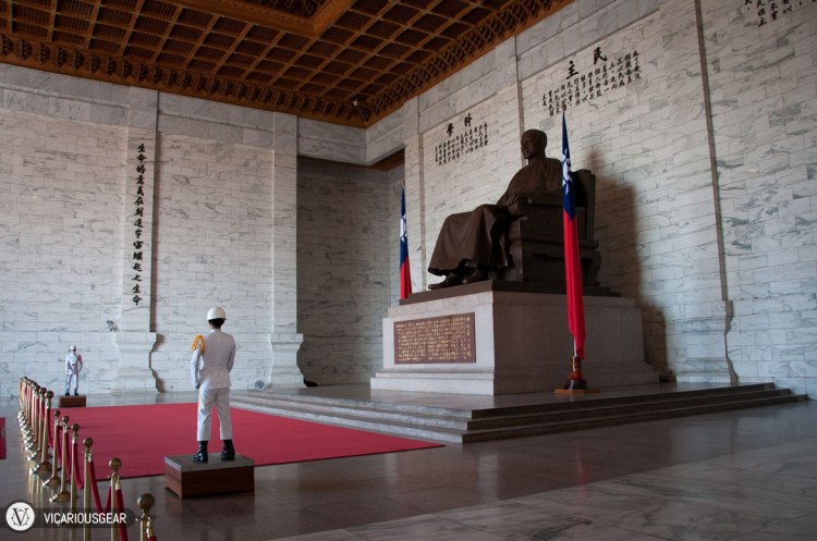Directly in front of the statue are two guards that stand absolutely still for an hour straight.