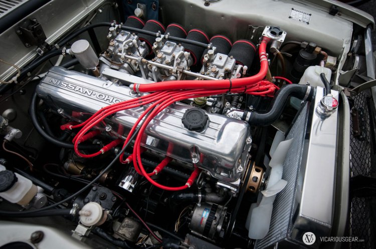 All the bits and pieces installed plus new silicone radiator hoses. She seems to be running well without the fan shroud for now.