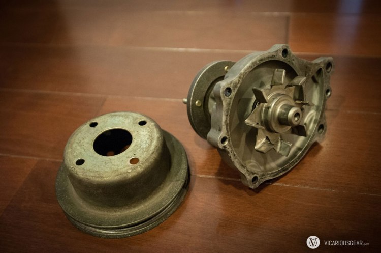 The old Aisin water pump turned out to be fine. So, I'll clean up the mounting surface and keep it as a spare for cross country trips.