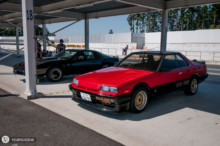 Super clean red over black iron mask Skyline next to a...Knight Rider?