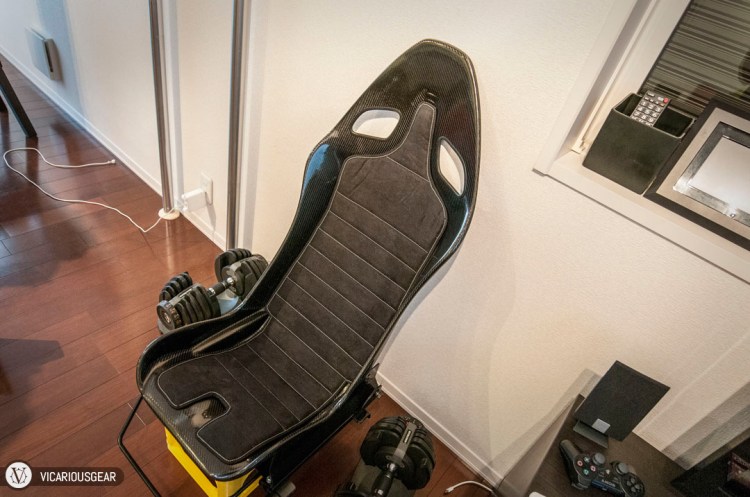 Here I'm using a plastic Asahi bottle bin to prop the seat and bride rails up and level against the wall. I opted to drill the mounting holes myself so I could customize the seat angle to my liking. This was definitely a case of measure twice (or ten times) and cut once.