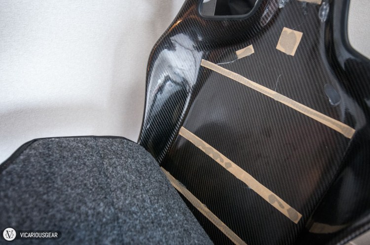 First order of business after drilling the mounting holes was to pull off the thin padding from the carbon shells.