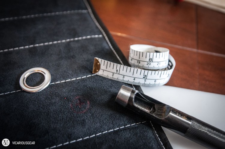 After considering the grommet locations, I marked the spot for the hole.