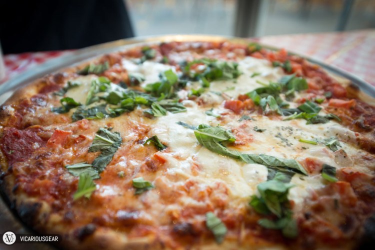 This is the "Caprese". Probably a wiser choice for those looking for a lighter less protein packed pie and still really good. And for those that might be wondering, Mimi and I finished two pizzas...