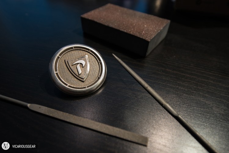 A little filing and sanding of the perimeter and select details to create some contrast.