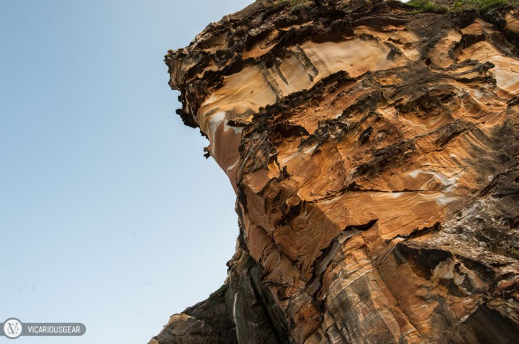 Mimi and I got hungry so we walked out of the park and around the east side of the cape. This was an interesting area devoid of tourists but filled with more geological formations.