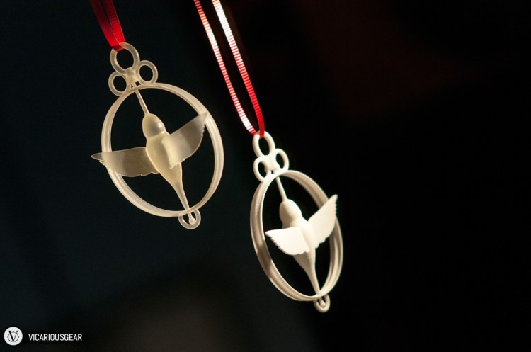 I decided to dust off my CAD skills and create a moving hummingbird pendant as the gift. Since it was my initial test and I was short on time, I had it printed in two different materials.