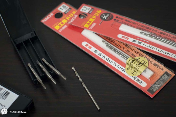 Speaking of doing things by hand, drilling and tapping the 2mm x.04 threads had me terrified since I didn't want to mess up the piece. The various surface angles made the Gundam difficult to mount flat on its sides, so I had to drill the 1.7mm holes perpendicular to its upright centerline by eye.