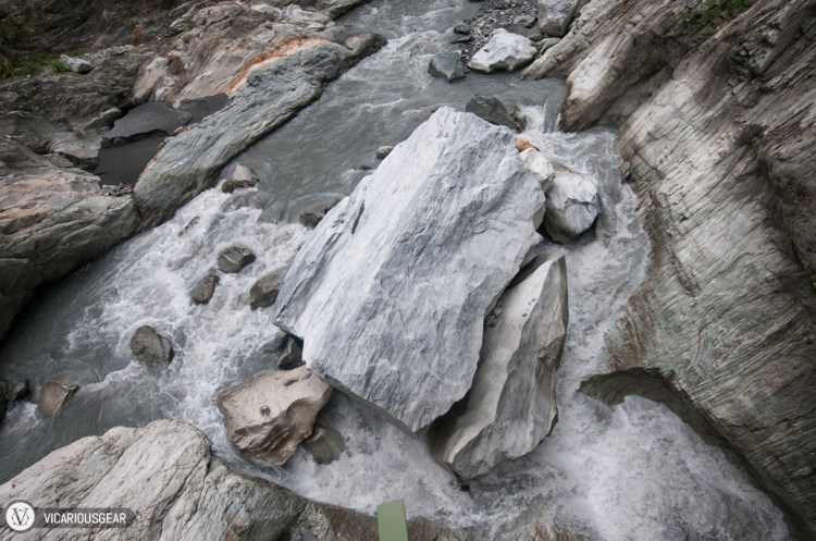 Giant boulder split by the rushing water.