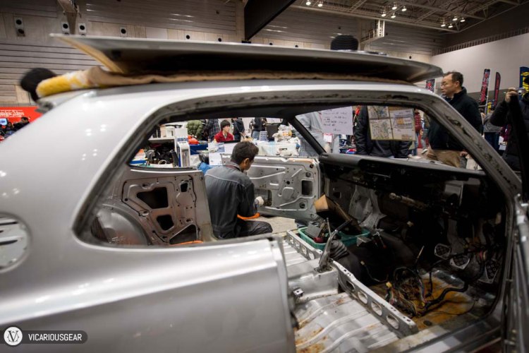 Next to the Datsun 16 was another shop reassembling a 2000GT in the middle of the show.
