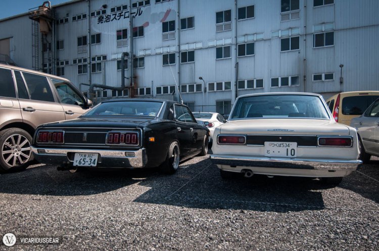 Good vs Evil. Nissan 230 Cedric and 2000GT Skyline sedans.