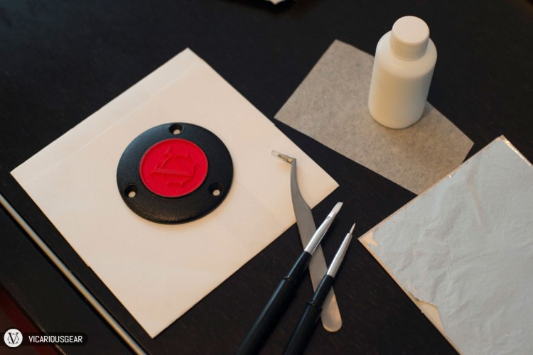 After painting came a technique I just started to learn about called gilding. I decided to use silver leaf and the gilding process to make the logo really shine. Another reason I decided to do this is because I have been trying to integrate some Japanese traditions into my fabrication choices.