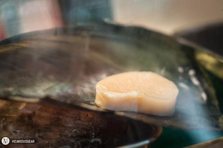 This giant scallop was calling me from inside the case directly in front of me.