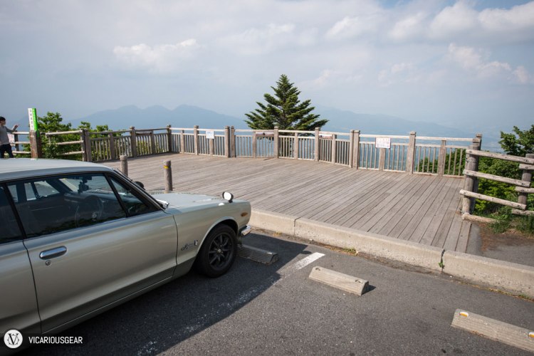 You actually have to wander off to the left in order to get the right view of the road. Most people are there to look at the city and landscape so the main viewing deck is built to cater to those interests.